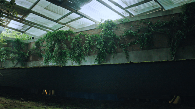 Futuristic indoor garden revealing a hidden space