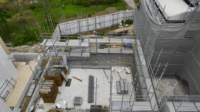 Construction site with scaffolding and materials