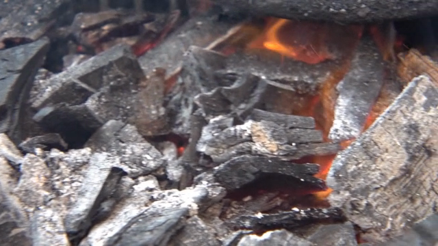 Burning charcoal with glowing embers