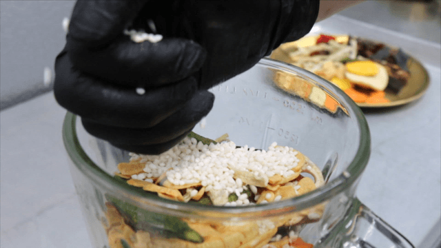 Various ingredients poured into glass bowl