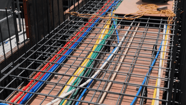 Colorful cables laid on a construction site