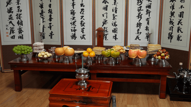 Traditional Korean ancestral table with fruits and food