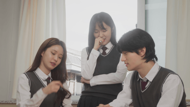 Students discussing a group project together