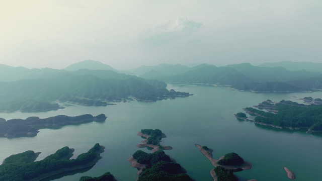 Tranquil lake surrounded by mountains