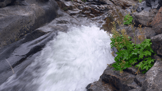 Small waterfall flowing over rocks