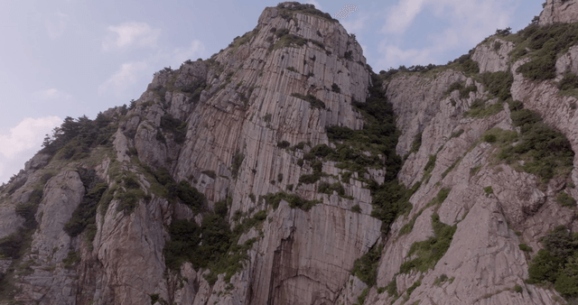 Majestic rocky mountain with greenery