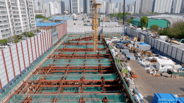 Urban construction site with cranes