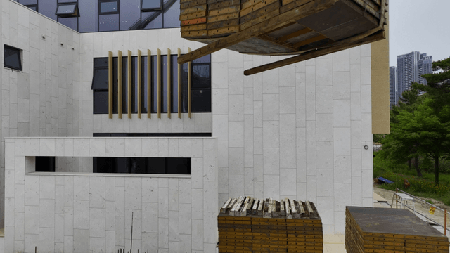Building under construction with materials