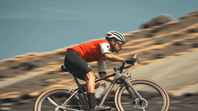 Cyclist racing on a rugged outdoor trail