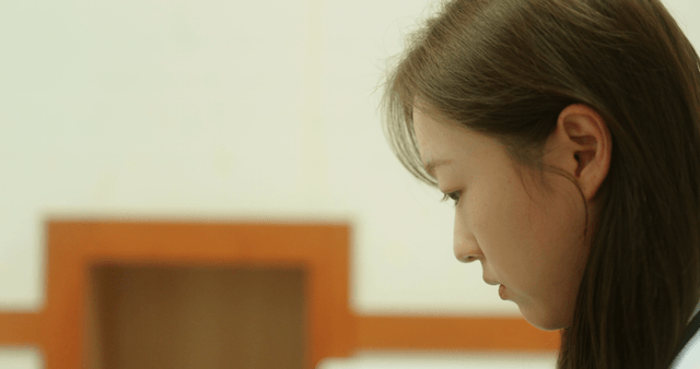 Woman deep in thought indoors
