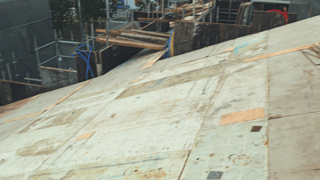 Construction site with scaffolding and materials