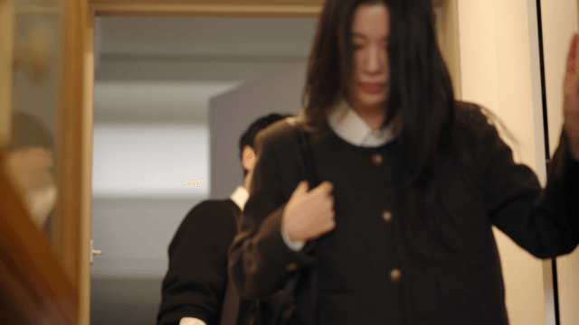 Couple entering home separately with annoyed expressions