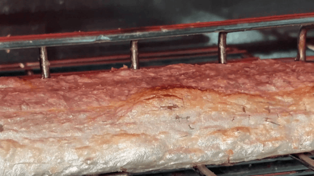 Cutlassfish roasting to golden brown in the oven