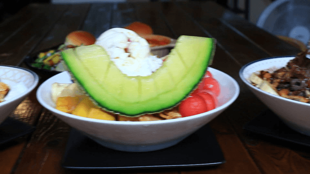 Various bingsu desserts on a table