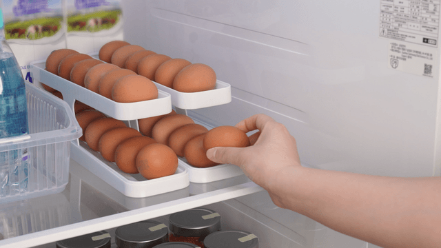Eggs neatly arranged in a refrigerator