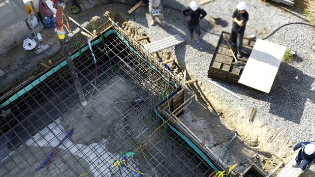 Concrete being poured at a construction site