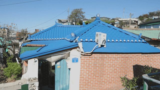 Traditional Korean house with blue roof