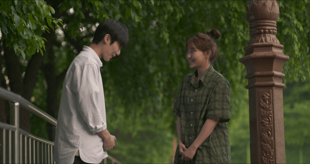 Couple having a conversation outdoors