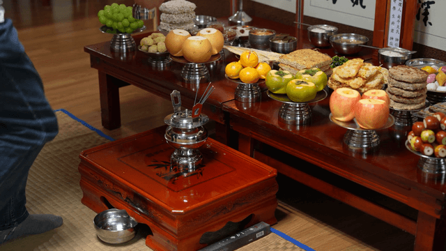 Traditional holiday ritual offering ceremonial liquor