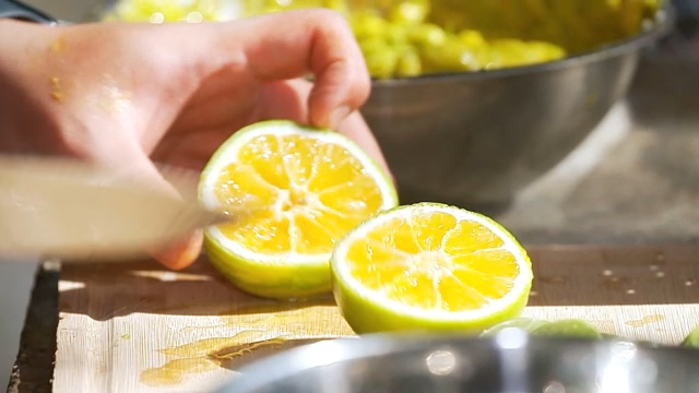 Slicing and squeezing fresh lime