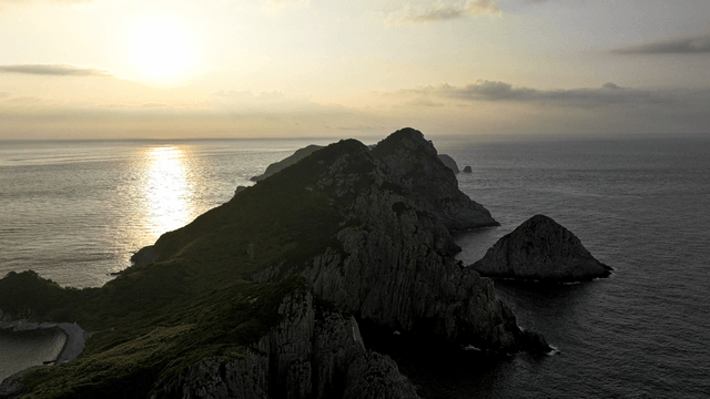 Sunset over a serene island landscape