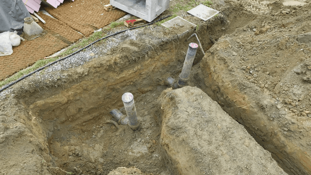Construction site with buried pipes