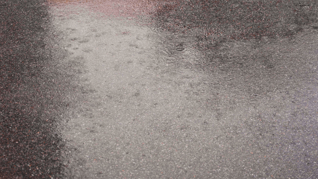 Rain puddle on asphalt