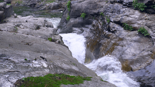 Small waterfall flowing over rocks