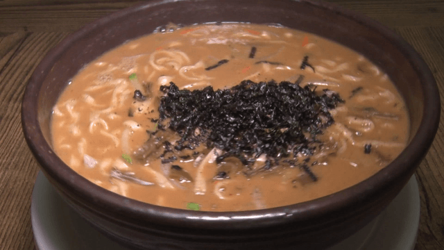 Noodle soup with seaweed garnish