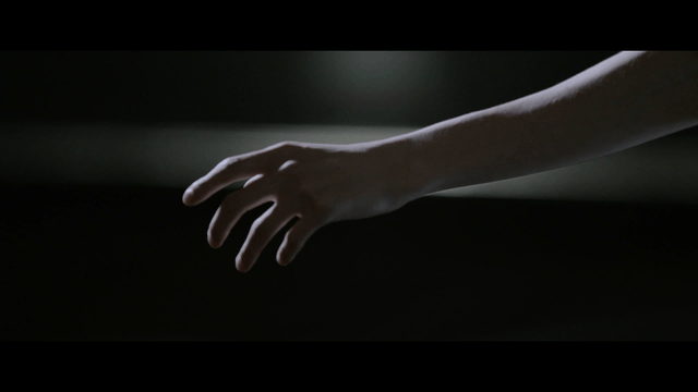 Hand pushing away grasped hand at dark night