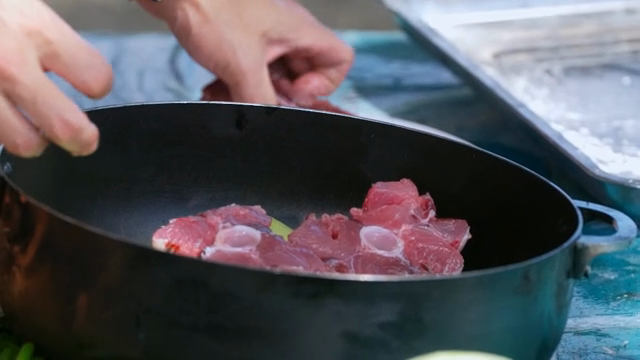 Preparing meat for cooking outdoors