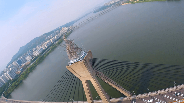 Bridge over the river with a view of the city skyline