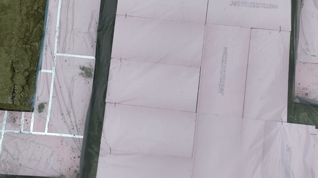 Construction site with pink insulation