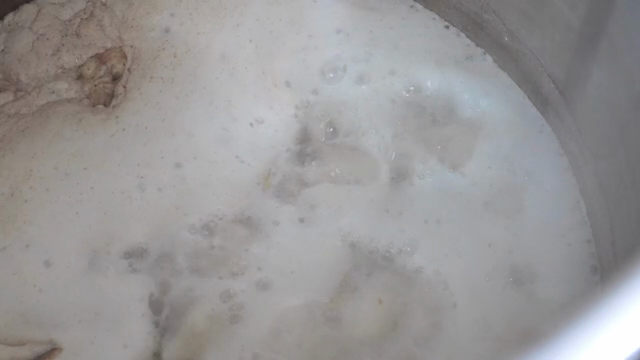 Boiling broth in a large pot