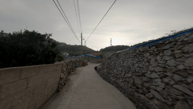 A quiet village path with stone walls