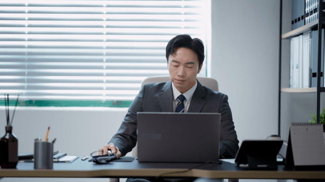 Man working at a desk in an office