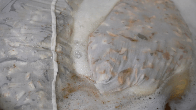 Ingredients boiling in a large pot