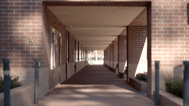 Quiet outdoor brick corridor in the afternoon