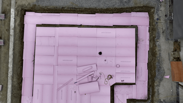 Construction site with pink insulation boards