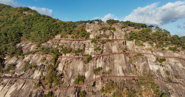 A scenic mountain with a winding path