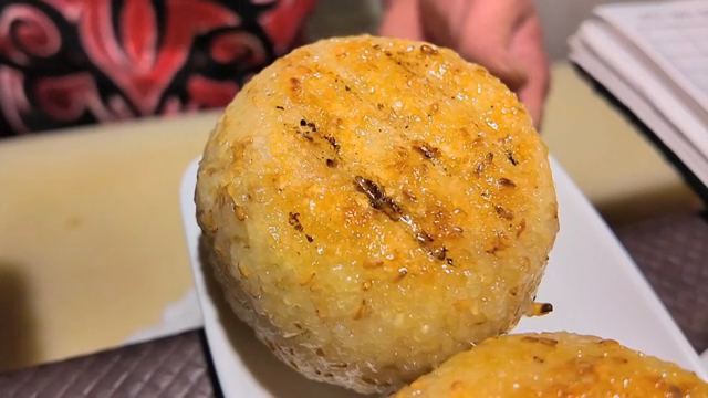 Grilled rice balls on a plate