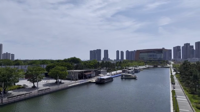 Modern cityscape with river and buildings