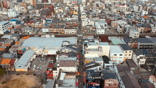 Aerial view of a bustling Japanese cityscape