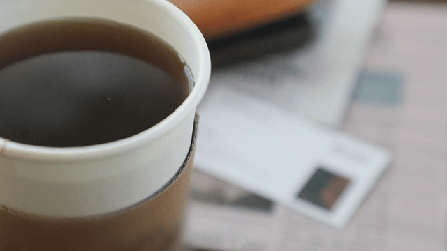 A cup of coffee on a table