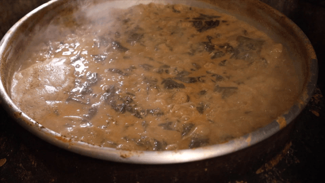 Loach soup boiling on the stove