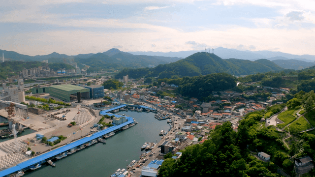 Coastal village surrounded by mountains