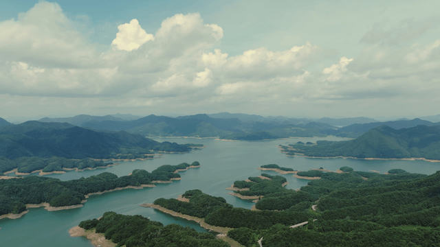 Vast lake surrounded by lush mountains