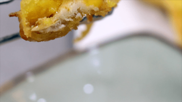 Cross section of fried ginseng cut with scissors