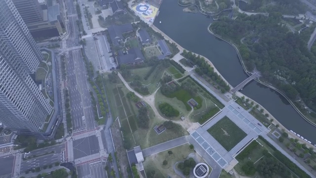 Aerial view of a city with green spaces