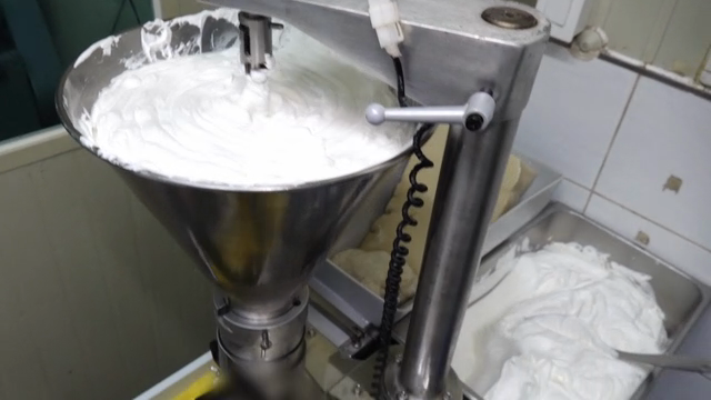 Industrial machine mixing cream